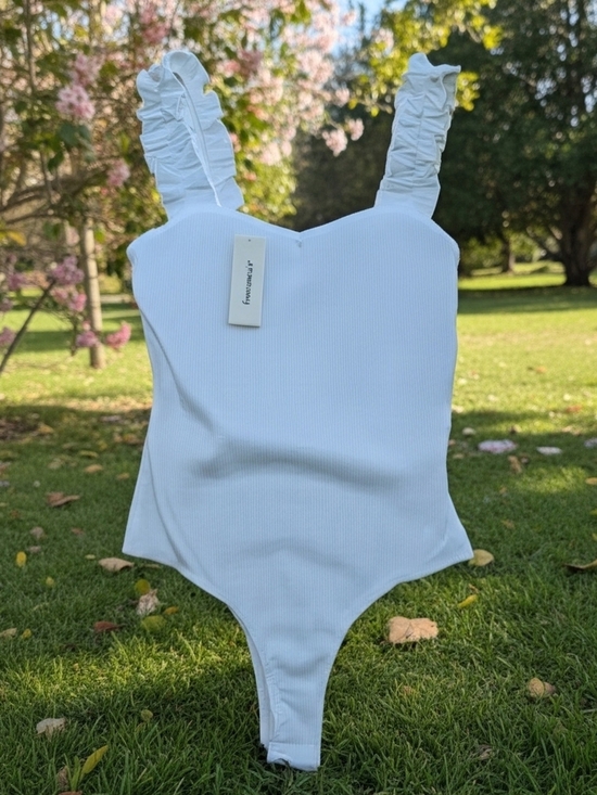 Blue Rain Tops - NWT Francesca's Blue Rain White Ribbed Bodysuit w/ Ruffle Strap Detail - Size M
